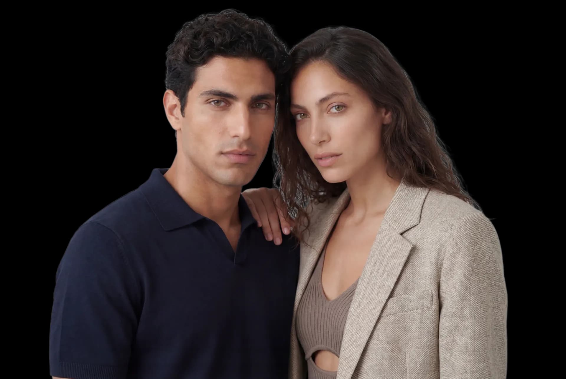 Two AI models, a man in a navy polo and a woman in a linen blazer